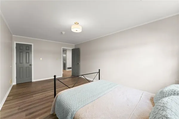 a room with gym equipment and a table