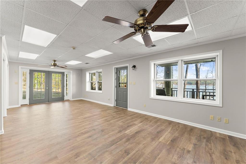 103 Tugalo Point Lavonia, GA 30553 - Photo 37 of 70 a view of an empty room with a window and wooden floor