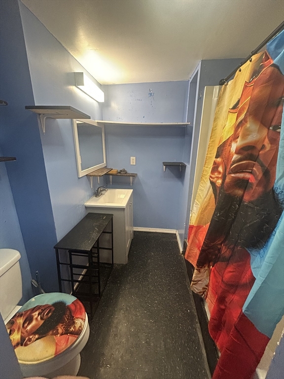 62 Washburn Street Springfield, MA 01107 - Photo 11 of 16 a room with musical instruments