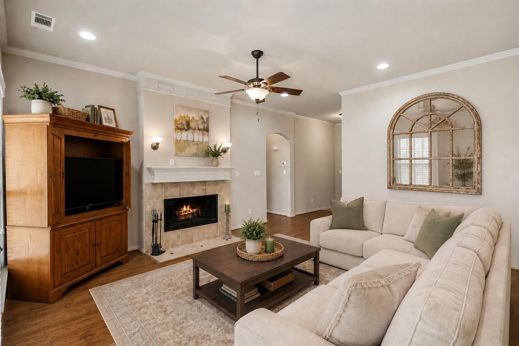 1852 Meadowview Canton, TX 75103 - Photo 5 of 28 a living room with furniture a fireplace and a flat screen tv