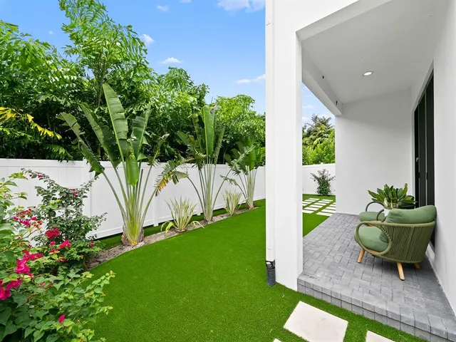 a view of backyard of house