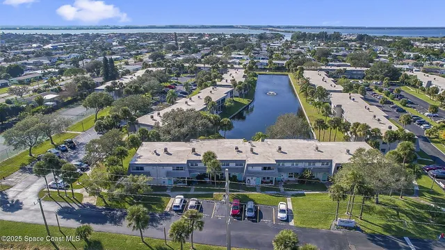 an aerial view of a house with a garden