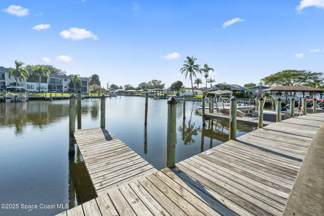 a view of a balcony with wooden floor
