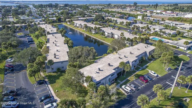an aerial view of a city with lots of residential buildings