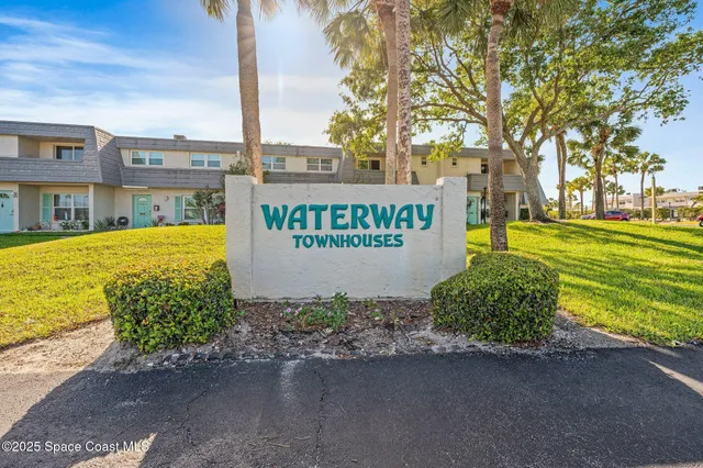 a sign on the side of a road