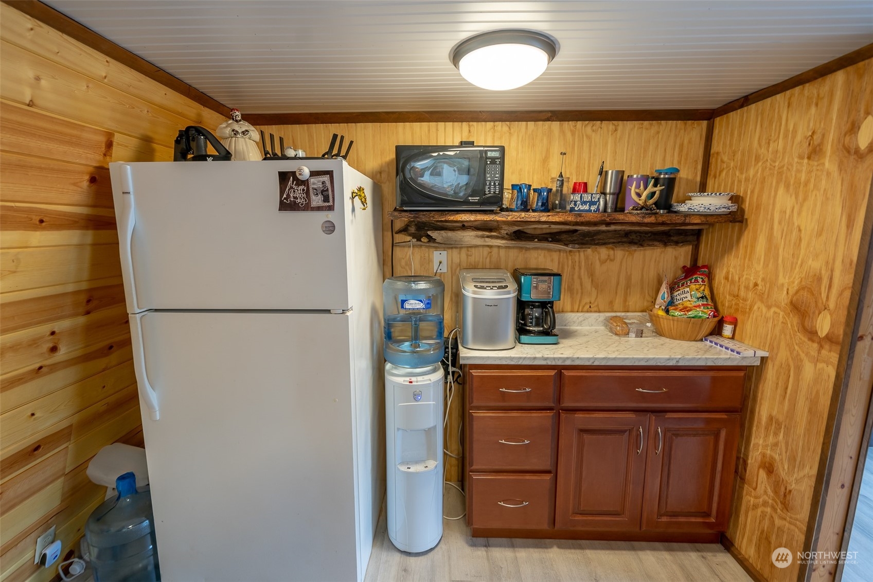 12630 West Shelton Matlock Road Shelton, WA 98584 - Photo 12 of 25 a kitchen with a refrigerator and a stove