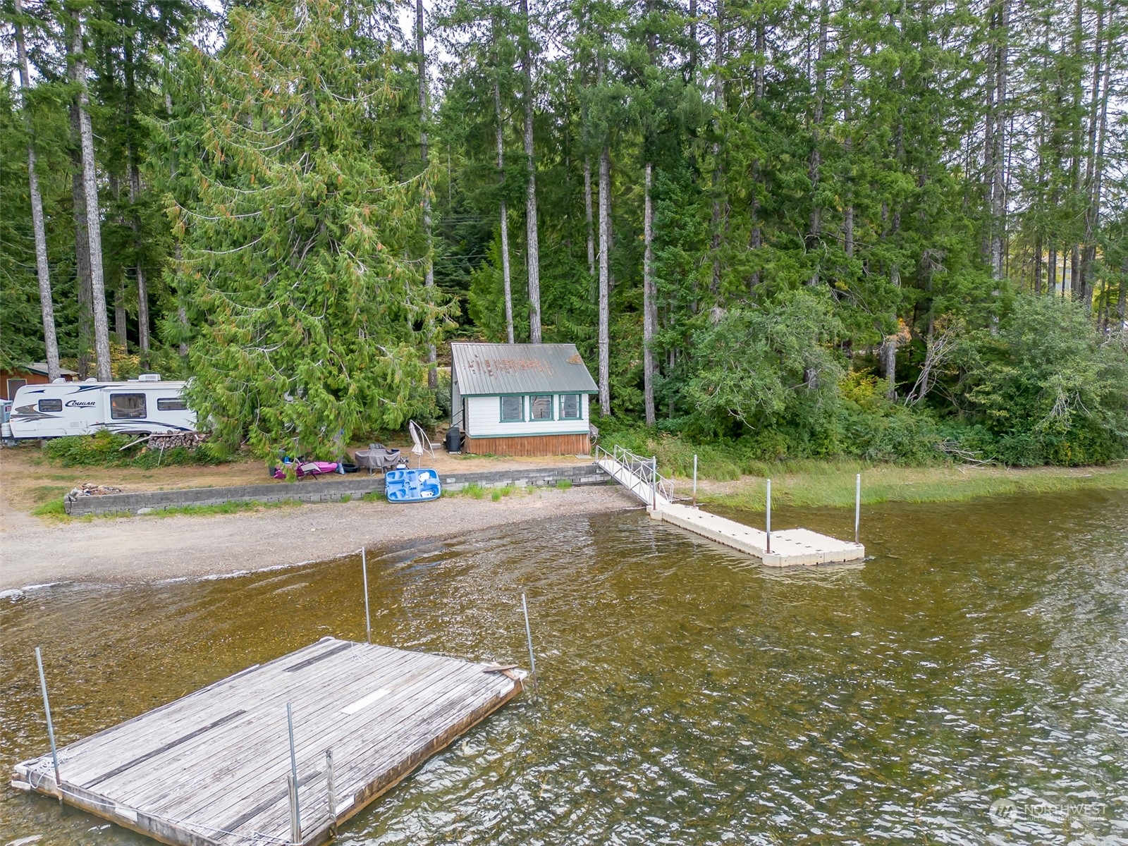12630 West Shelton Matlock Road Shelton, WA 98584 - Photo 15 of 25 a view of a swimming pool with a yard