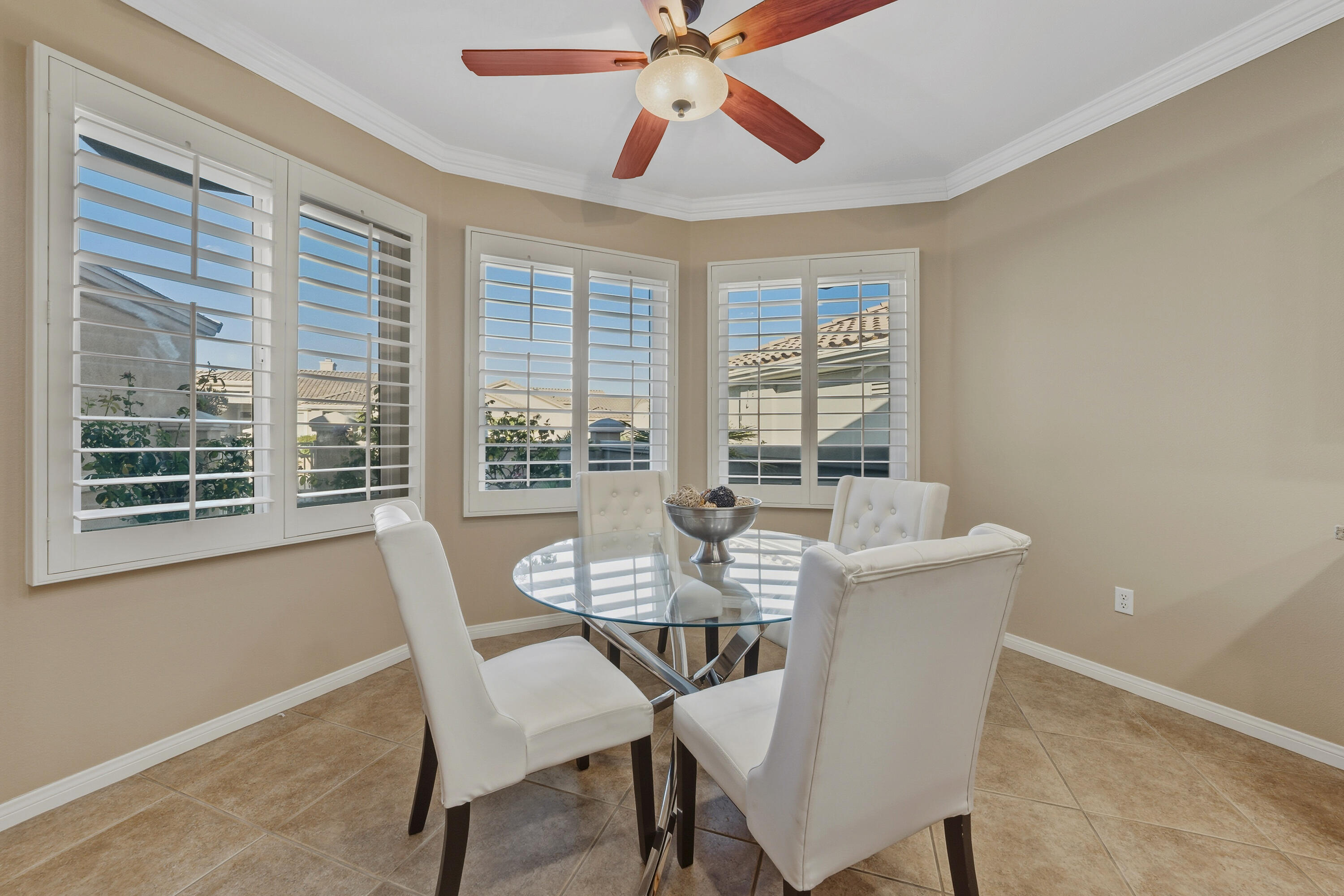 78589 Rainswept Way Palm Desert, CA 92211 - Photo 17 of 30 a view of a dining room with furniture window and outside view