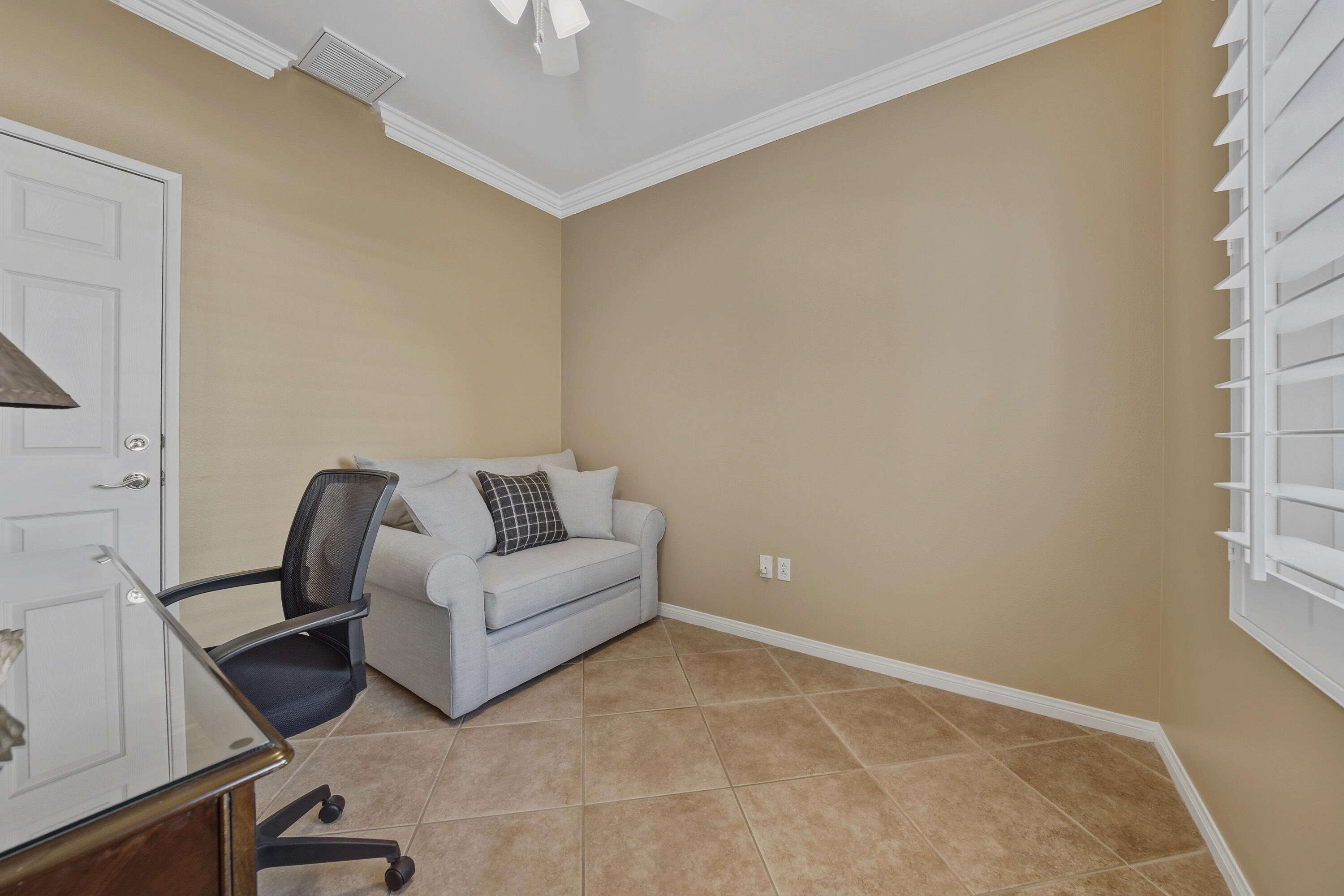 78589 Rainswept Way Palm Desert, CA 92211 - Photo 20 of 30 a living room with furniture and a window