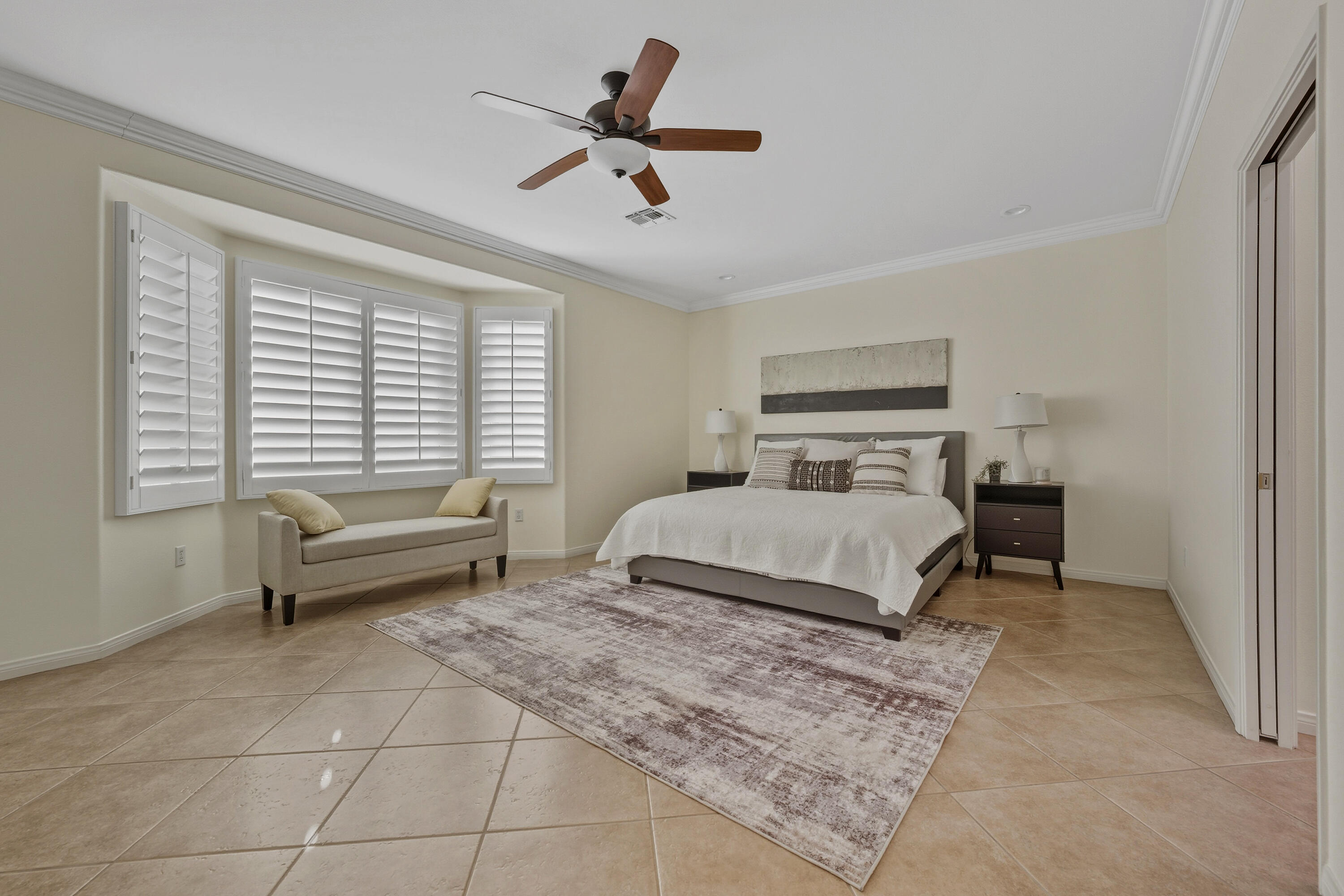 78589 Rainswept Way Palm Desert, CA 92211 - Photo 21 of 30 a bedroom with a bed and a window