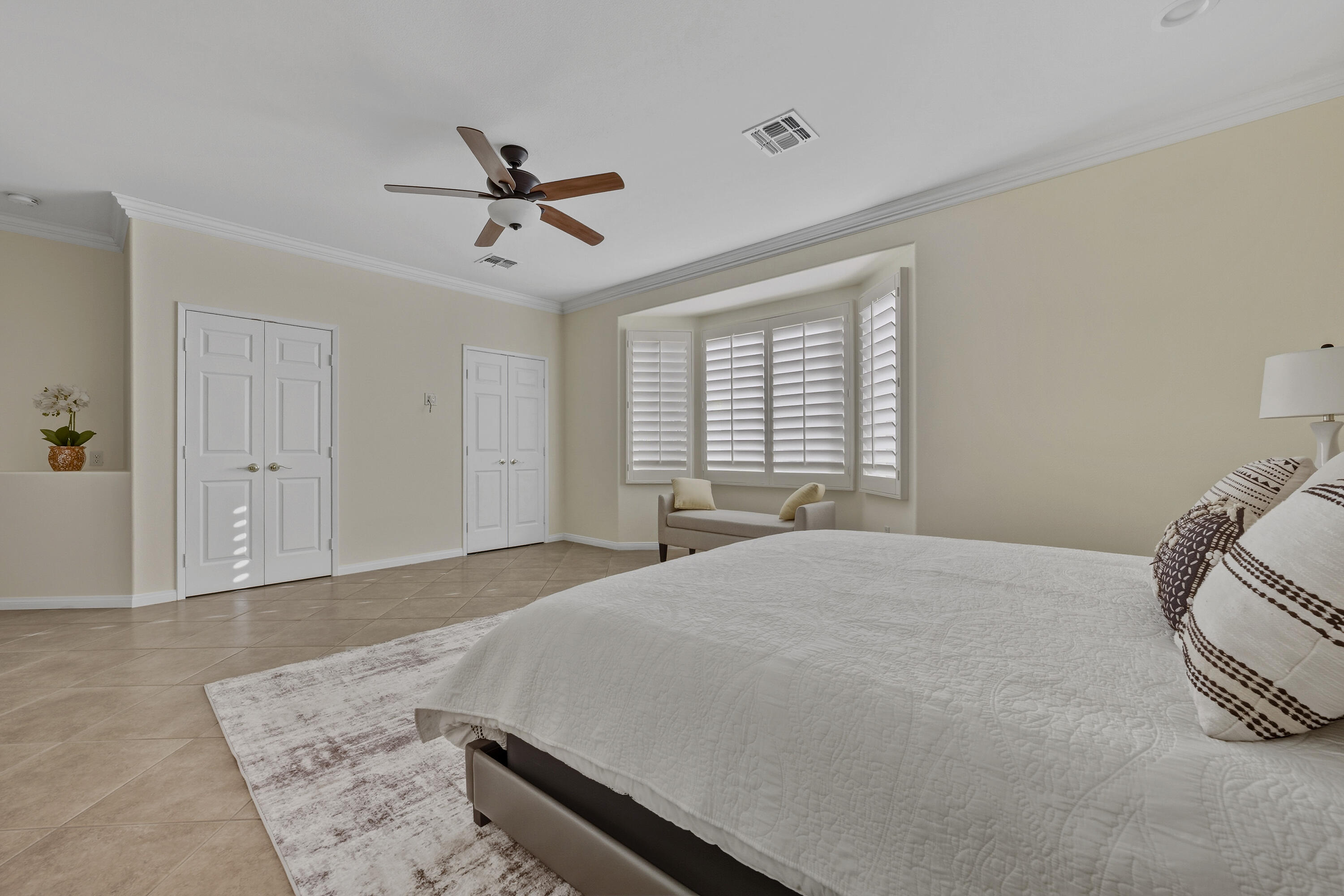 78589 Rainswept Way Palm Desert, CA 92211 - Photo 22 of 30 a bedroom with a bed and window