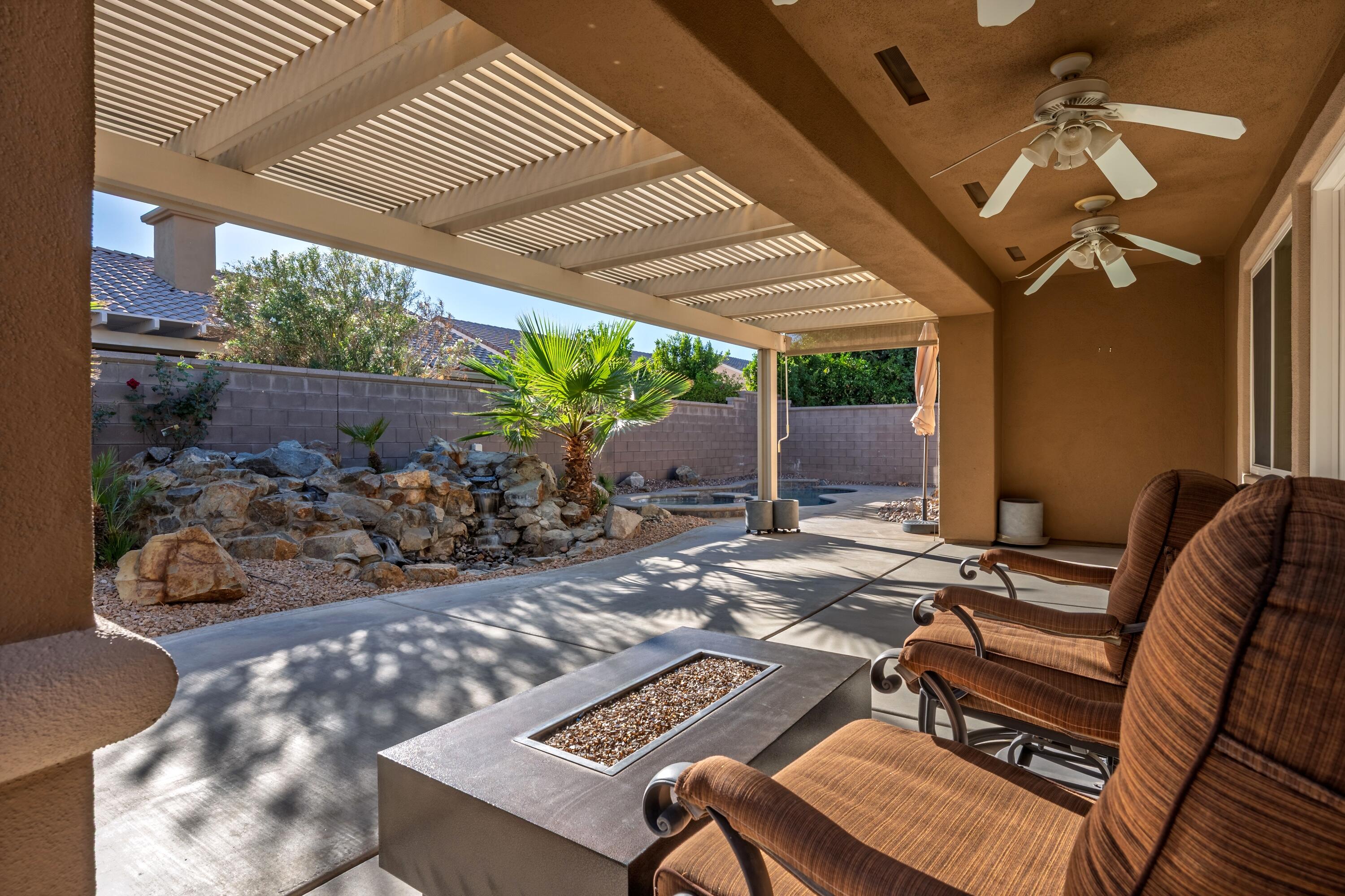 78589 Rainswept Way Palm Desert, CA 92211 - Photo 3 of 30 a outdoor living space with patio furniture
