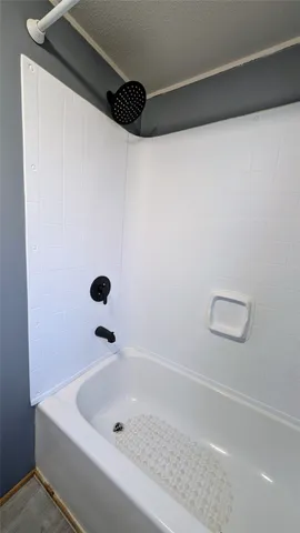 a bathroom with a bathtub