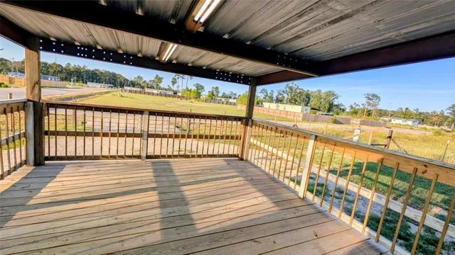 a view of porch with wooden floor and outdoor space