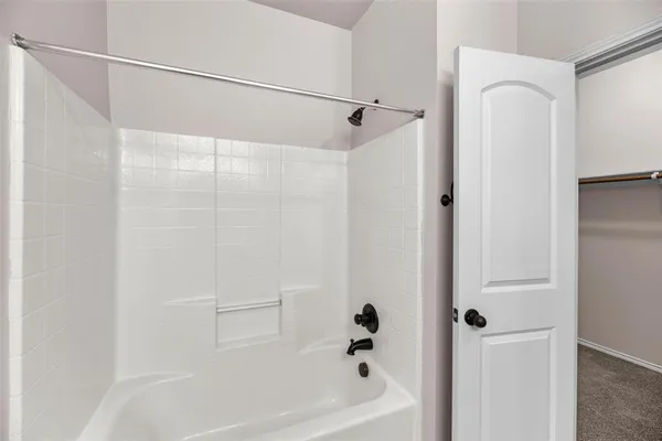 a bathroom with a bathtub