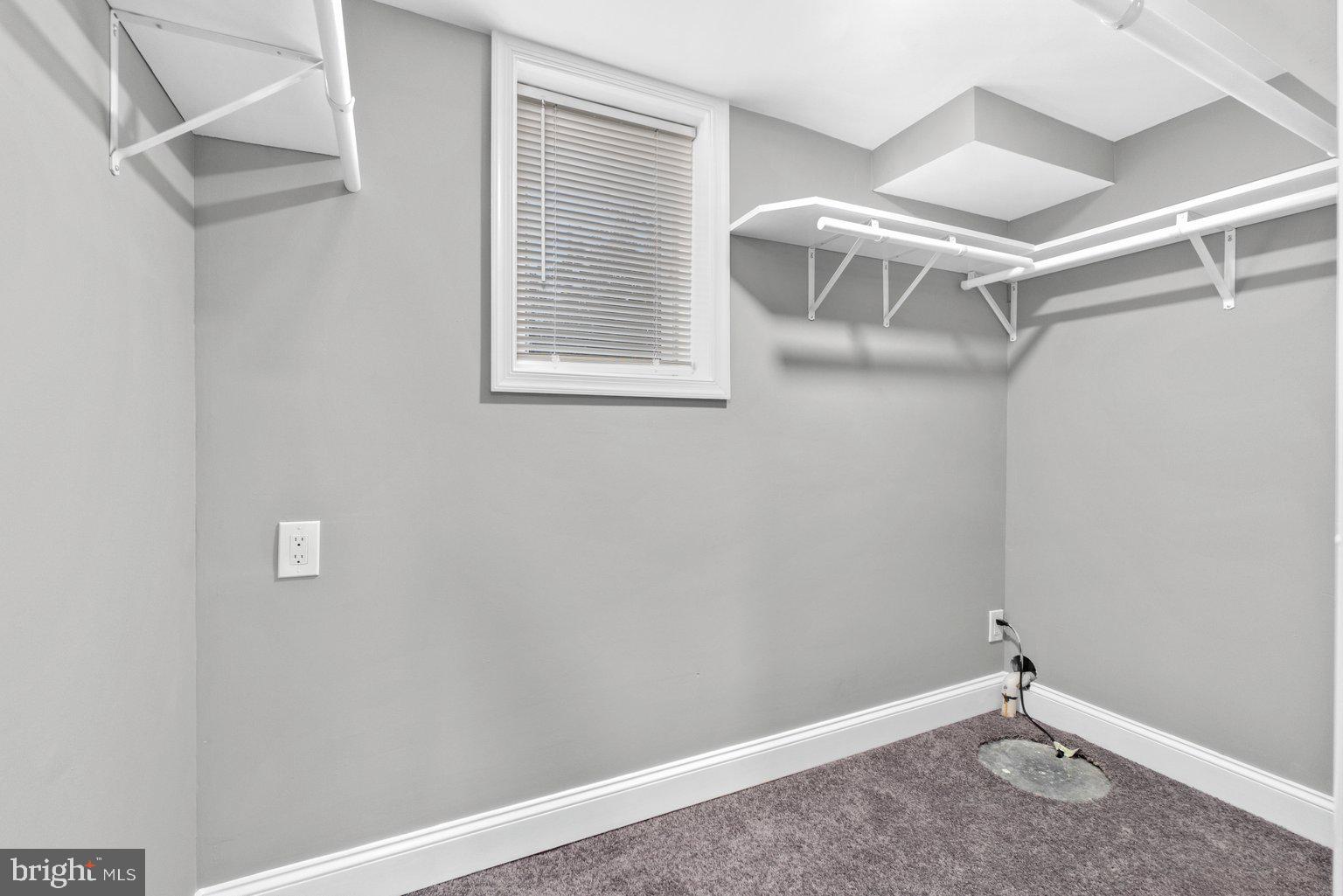 821 Stamford Road Baltimore, MD 21229 - Photo 31 of 36 Lower Level walk-in closet / storage