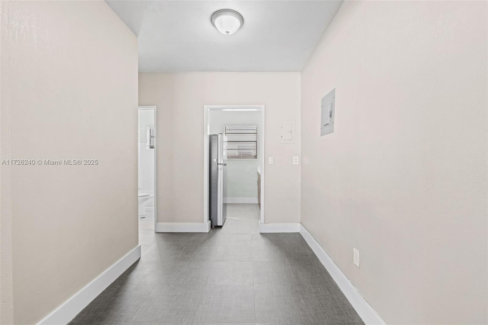 7745 Harding Avenue, Unit 22 Miami Beach, FL 33141 - Photo 3 of 9 a view of hallway with closet