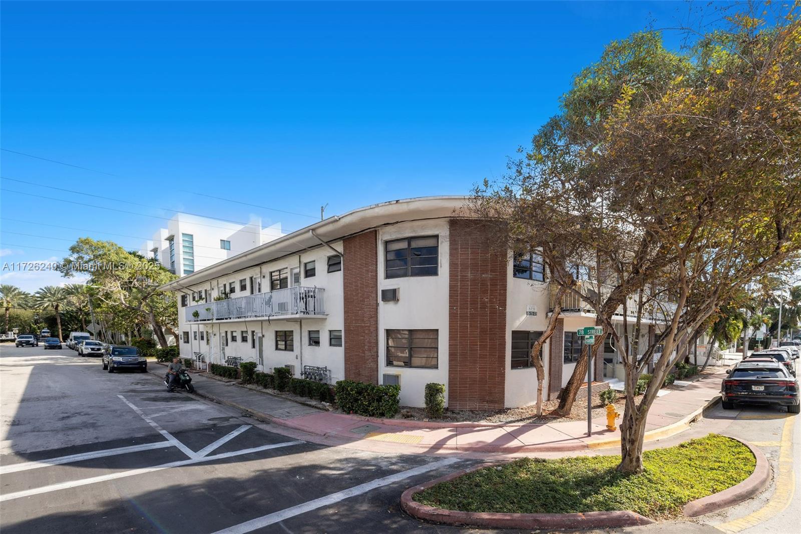 7745 Harding Avenue, Unit 22 Miami Beach, FL 33141 - Photo 9 of 9 a front view of a house with garden