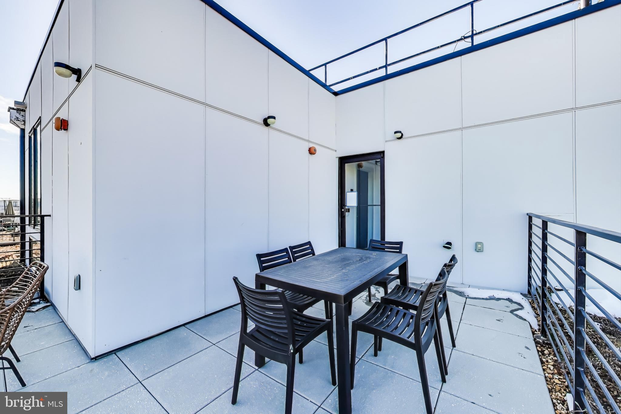 2310 4th Street Northeast, Unit 15 Washington, DC 20002 - Photo 17 of 21 a view of a dining room and livingroom with furniture