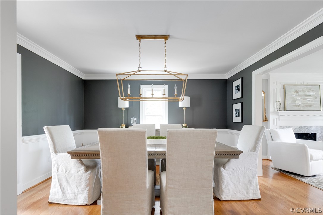 10685 Cherokee Road Richmond, VA 23235 - Photo 5 of 48 a view of a dining room with furniture and wooden floor