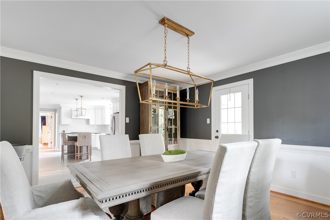 10685 Cherokee Road Richmond, VA 23235 - Photo 6 of 48 a view of a dining room with furniture