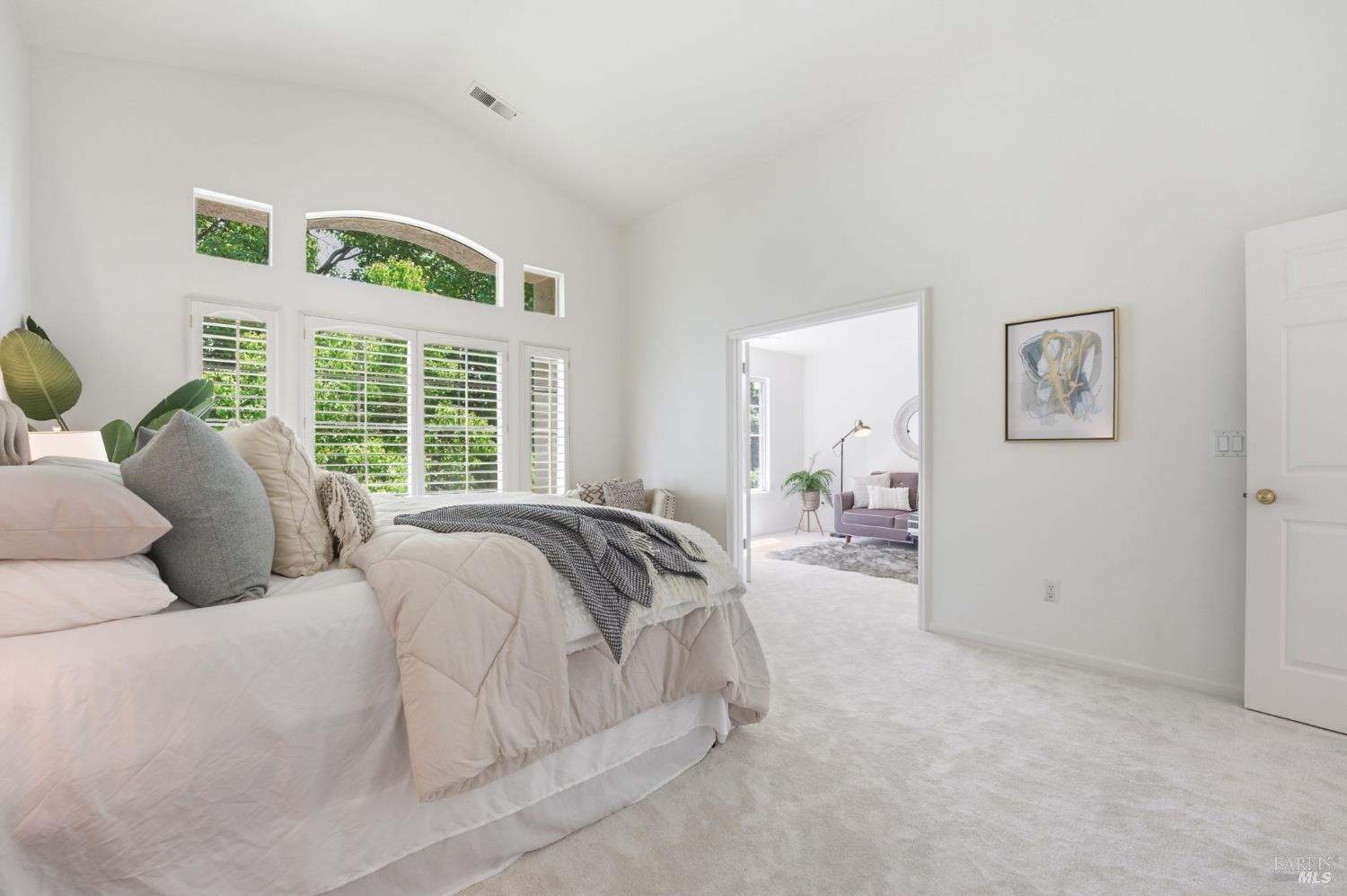 5148 Renaissance Court Fairfield, CA 94534 - Photo 55 of 79 a spacious bedroom with a bed and a large window