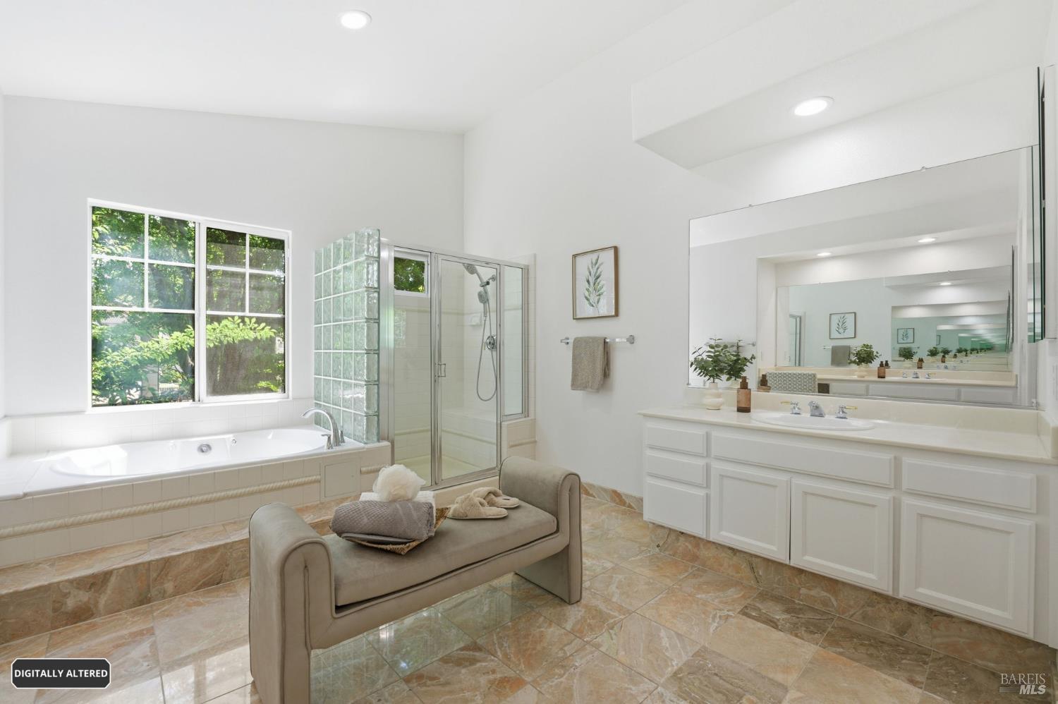 5148 Renaissance Court Fairfield, CA 94534 - Photo 61 of 79 a bathroom with a granite countertop tub sink and mirror
