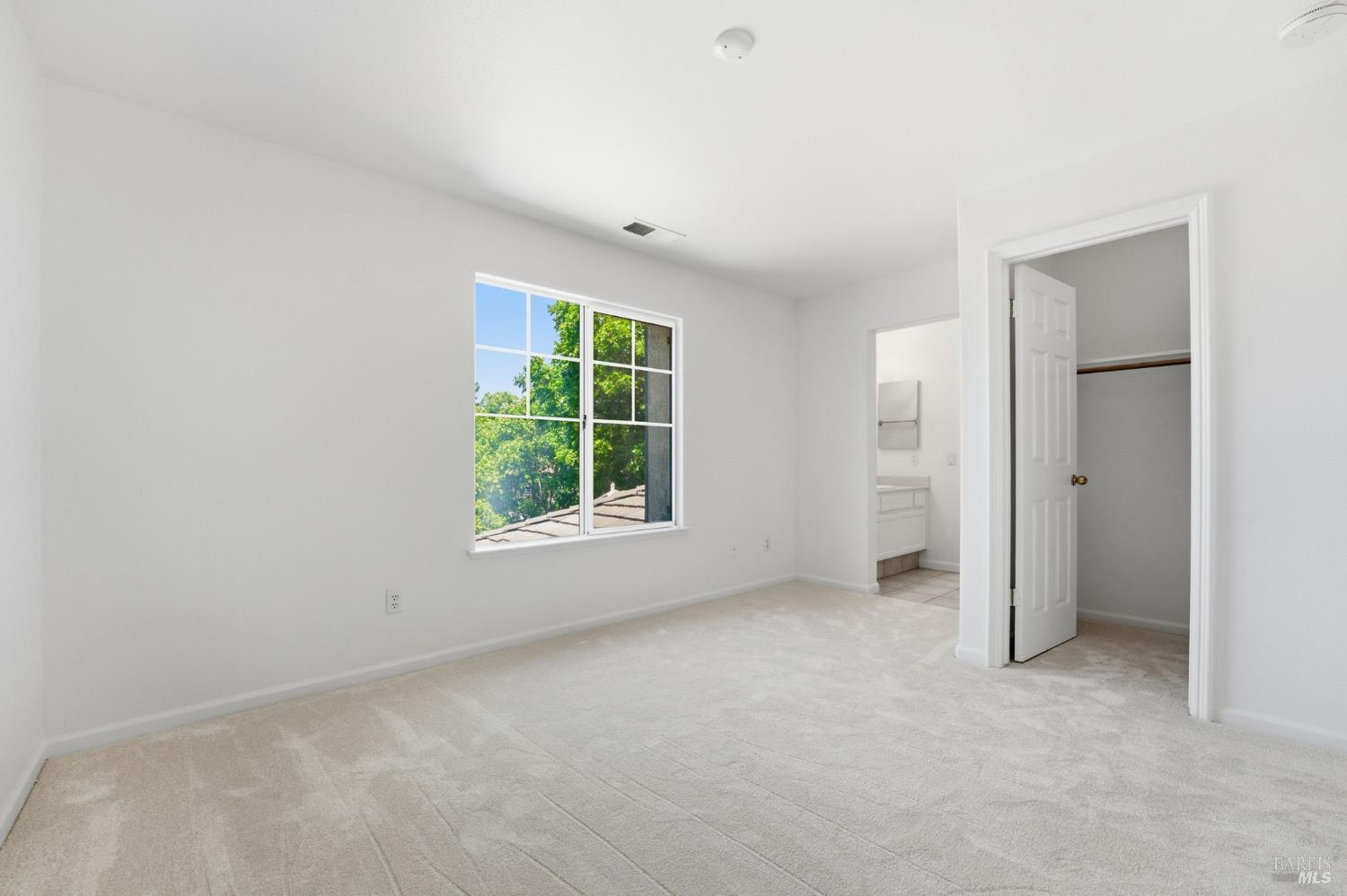 5148 Renaissance Court Fairfield, CA 94534 - Photo 69 of 79 an empty room with windows and closet