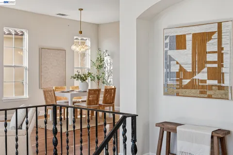 a view of balcony with furniture