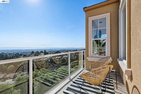 a view of a balcony with chair