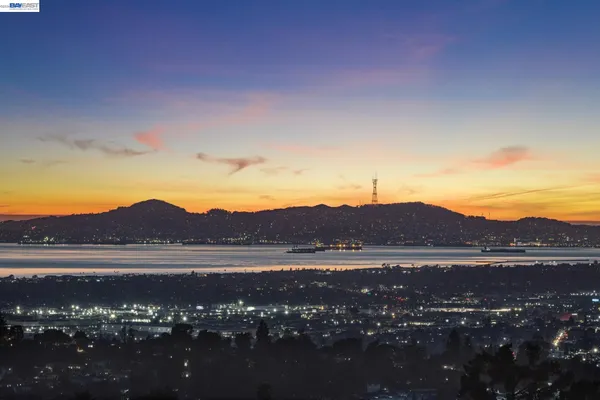 a living room with furniture or couch and a fireplace
