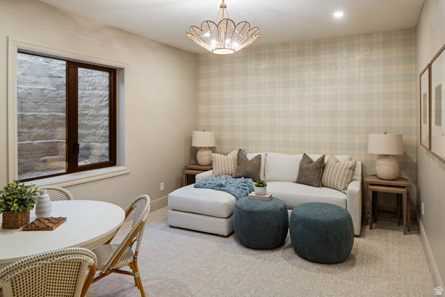423 Eldorado Drive Mapleton, UT 84664 - Photo 34 of 40 Living room featuring wallpapered walls, suspended lighting, and carpet floors