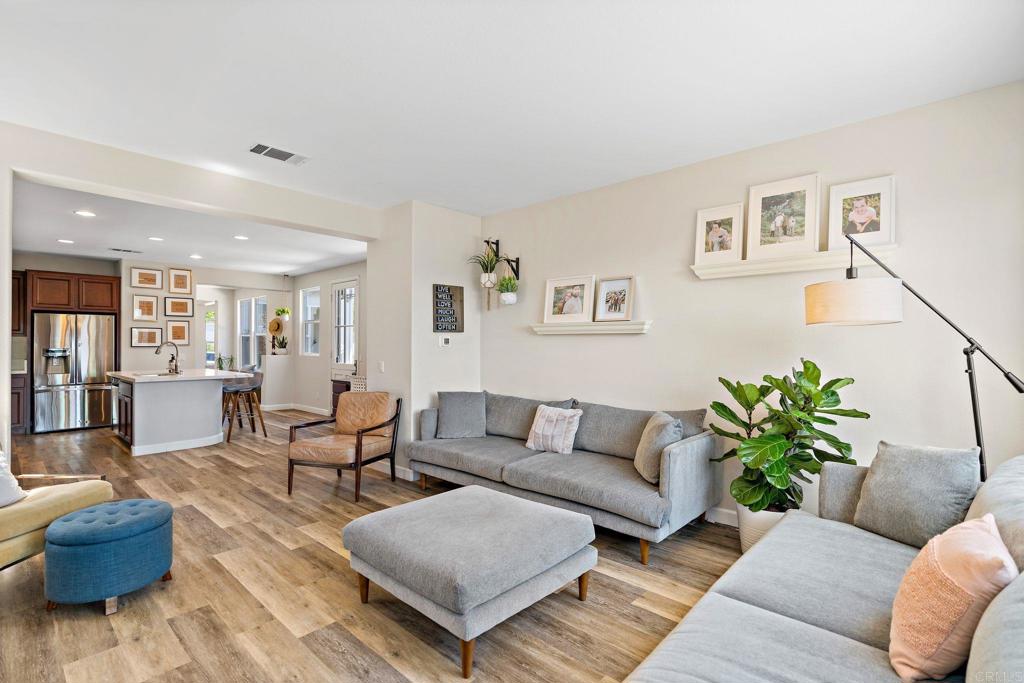 1673 Archer Road San Marcos, CA 92078 - Photo 13 of 47 a living room with furniture and a potted plant