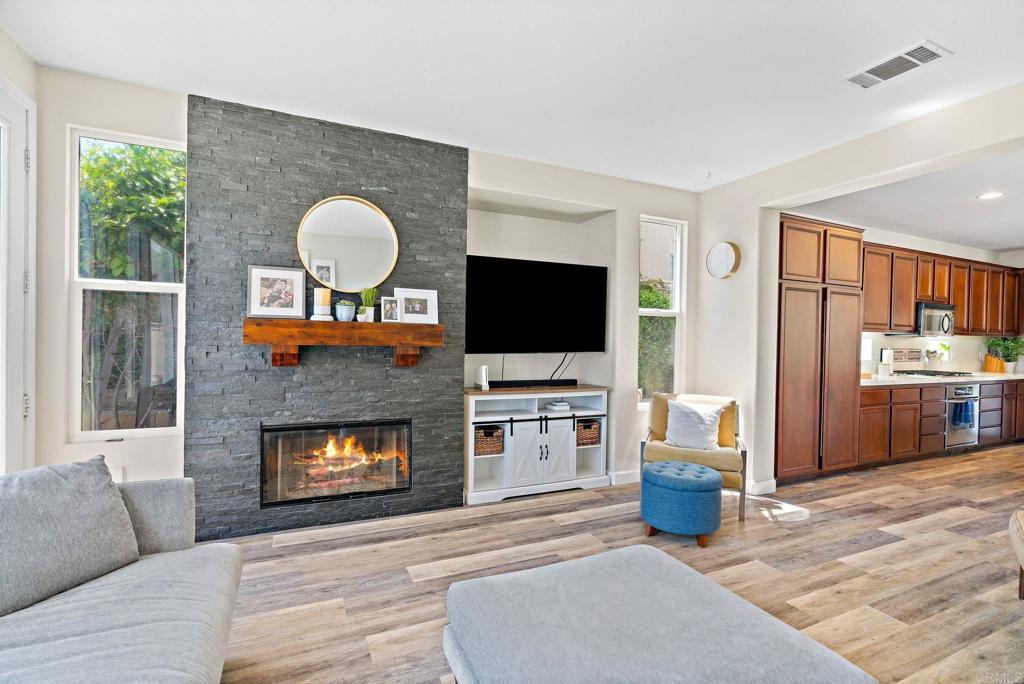 1673 Archer Road San Marcos, CA 92078 - Photo 14 of 47 a living room with furniture fireplace and flat screen tv