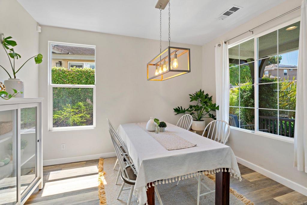 1673 Archer Road San Marcos, CA 92078 - Photo 15 of 47 a view of a dining room with furniture window and outside view