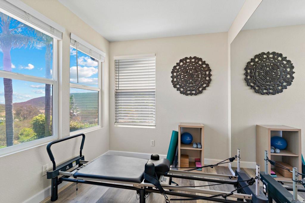 1673 Archer Road San Marcos, CA 92078 - Photo 22 of 47 a view of a workspace with furniture and a window