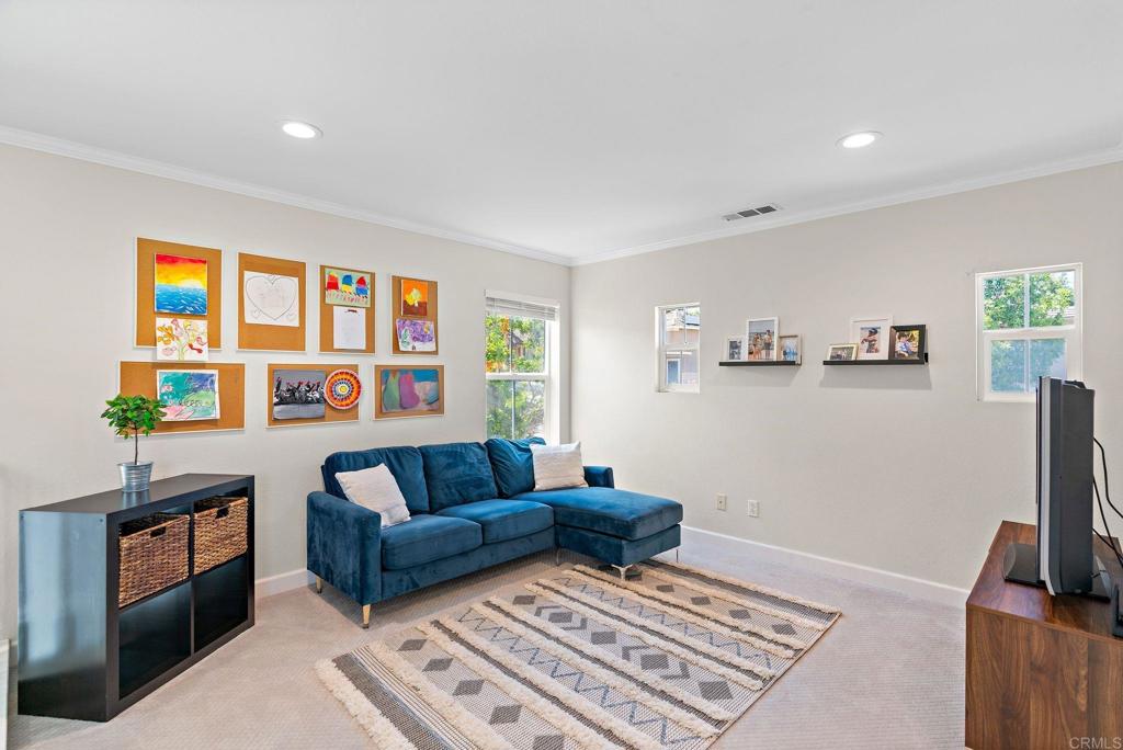 1673 Archer Road San Marcos, CA 92078 - Photo 23 of 47 a living room with furniture and a rug
