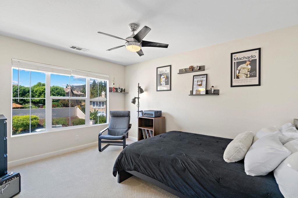 1673 Archer Road San Marcos, CA 92078 - Photo 24 of 47 a bedroom with furniture and a large window