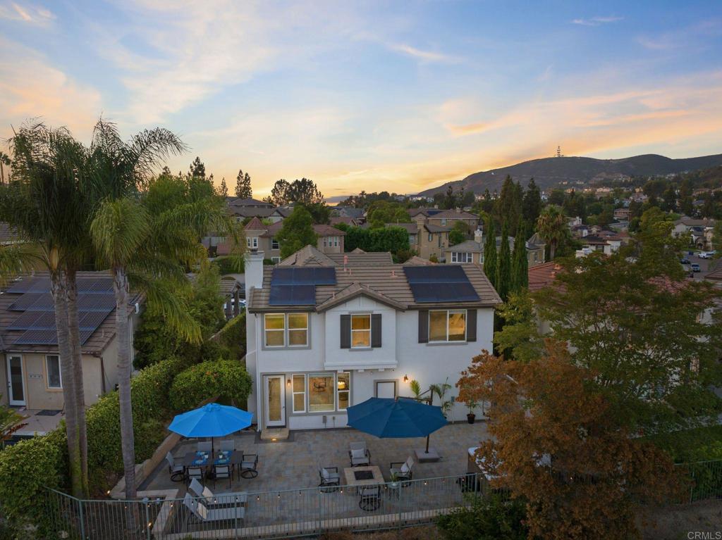 1673 Archer Road San Marcos, CA 92078 - Photo 42 of 47 a front view of a house with a yard and balcony
