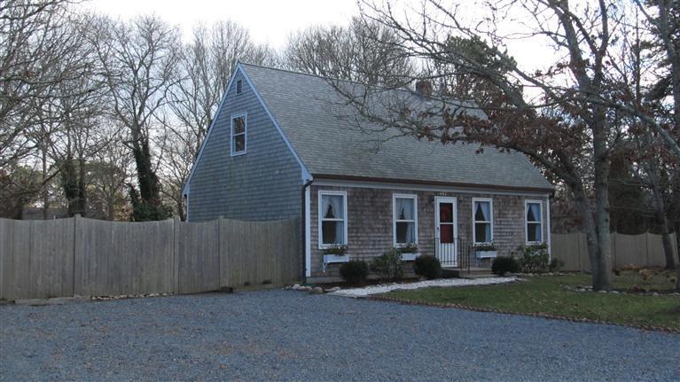 482 Lincoln Extension Road Hyannis, MA 02601 - Photo 2 of 16 a view of a house with a yard and large tree