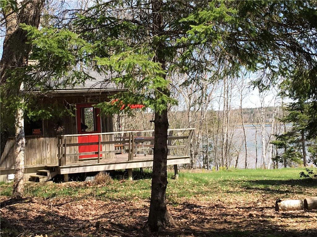 386 Pineo Point Road Harrington, ME 04643 - Photo 2 of 35 Nestled in the trees at the end of...