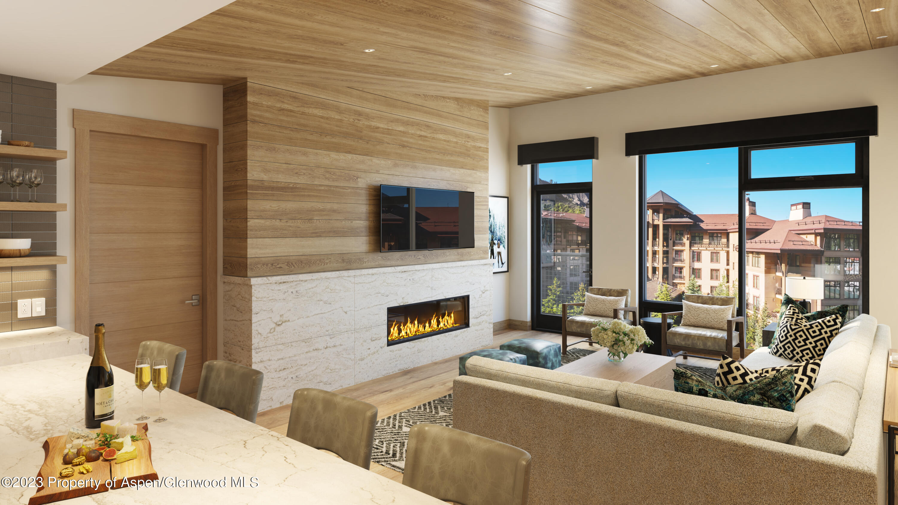 130 Wood Road, Unit 658 Snowmass Village, CO 81615 - Photo 1 of 7 a living room with furniture fireplace and flat screen tv