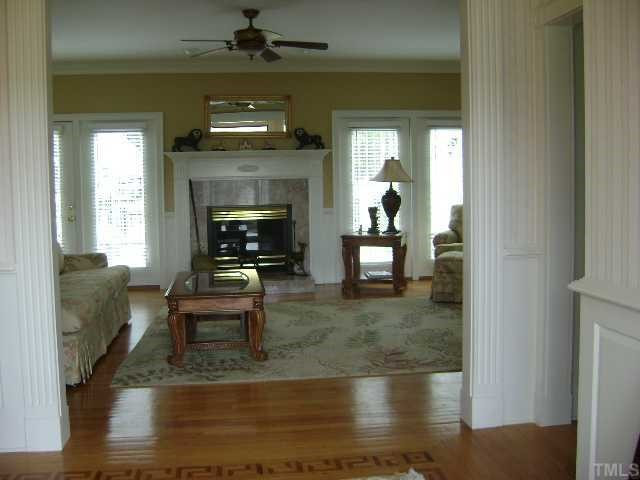 5317 Mill Dam Road Wake Forest, NC 27587 - Photo 6 of 12 Family room with fireplace. Its bright open and airy. Den/Family/Great Room