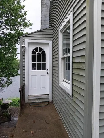 a front view of a house with a garage