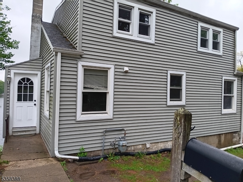 69 Fox Hill Road Denville, NJ 07834 - Photo 6 of 6 a view of a house with a balcony