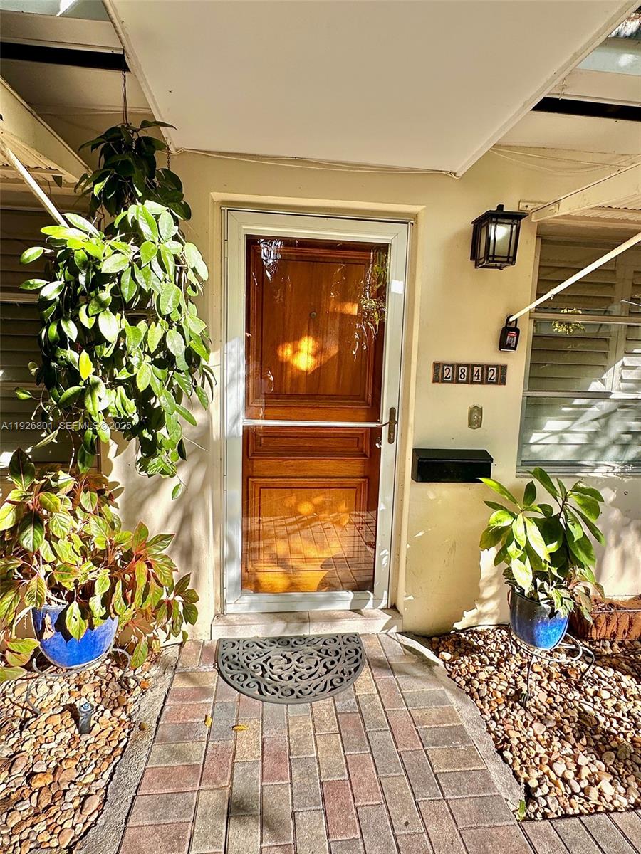 2842 Coconut Avenue, Unit B Miami, FL 33133 - Photo 2 of 23 a view of a entryway door of the house