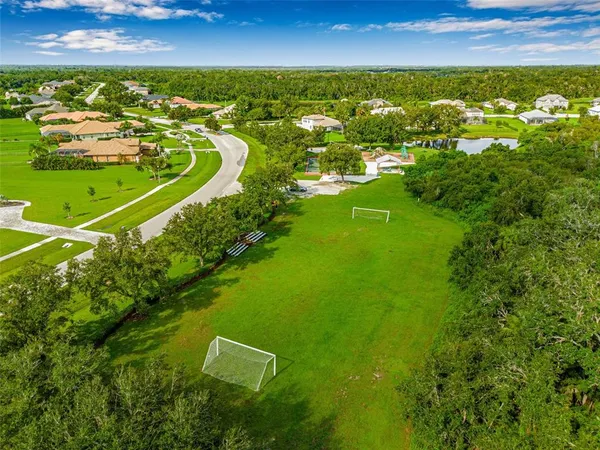 a view of a lake with a big yard