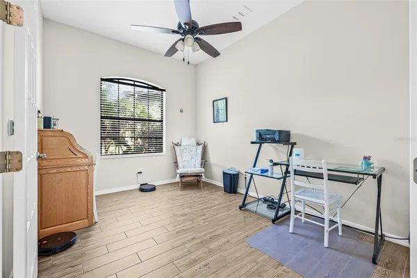 a living room with furniture and a window