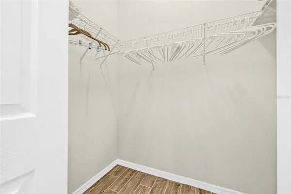 a view of a room with racks on the wall