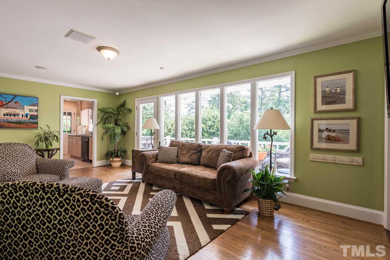 2320 Ridge Road Raleigh, NC 27612 - Photo 11 of 25 a living room with furniture and a large window